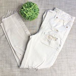 Free People skinny distressed high rise button fly jeans, lace inserts